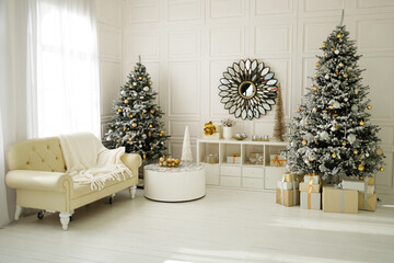 Beautiful holiday decorated room with Christmas tree and presents under it. New Year decorations at home, white and gold colors