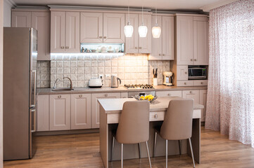 Interior of the apartment for rent. Light tone condominium