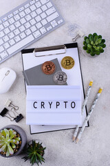 Bitcoin coins on office desk. Cryptocurrency concept