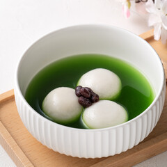 Matcha big tangyuan with red bean paste and matcha soup.
