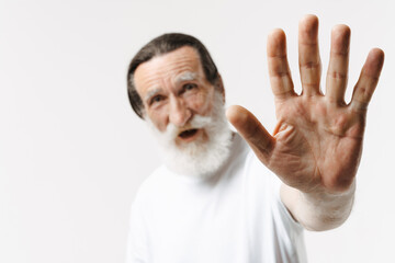 Fototapeta premium European senior man with beard looking and gesturing at camera