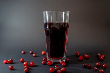 Fresh Cranberries juice in a glass. Freshly made, organic, rustic style.