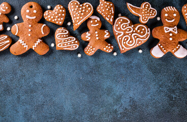 Christmas frame with gingerbread cookies. Christmas cookies, nuts and spices. Copy space for text. Winter holidays background mock up. New year composition. New year 2022