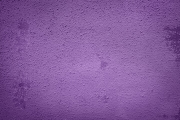Plastered concrete wall, painted in purple, surface texture.