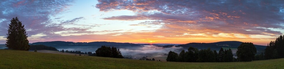 Naklejka na ściany i meble Morning panoramic sunset view from zdarske vrchy