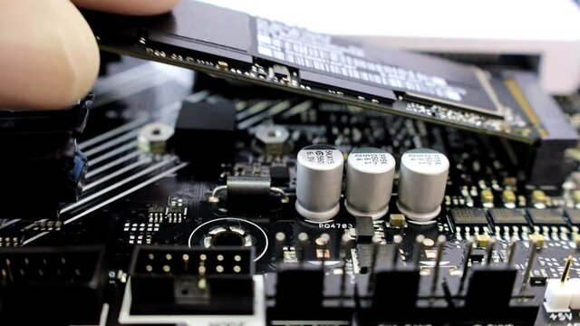 Electronic engineer of computer technology. Maintenance computer cpu hardware upgrade of motherboard component. Pc repair, technician and industry support concept.