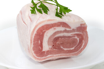 Frozen raw streaky pork belly on the white dish