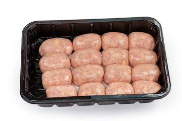 Uncooked chicken sausages in plastic container on a white background