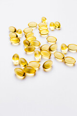 Omega 3 fish oil capsules isolated on white background