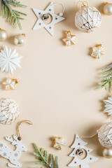 Vertical Christmas banner or poster. Vintage Christmas balls, stars decoration on beige background....