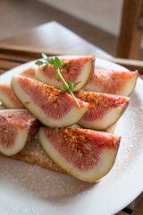 toast with figs on a plate, closeup.