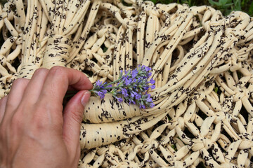 wicker bag string bag on the grass
