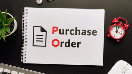 Business acronym PO or Purchase Order. Notepad with inscriptions on the desktop