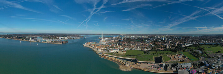 Portsmouth City aerial pano with Spice Island next to the entrance to the harbour and the Spinnaker Tower in view. Aerial panorama.