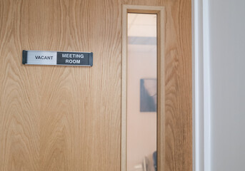 Norwich, Norfolk, UK – November 05 2021. Sign outside a private meeting room advising if the room is vacant or engaged