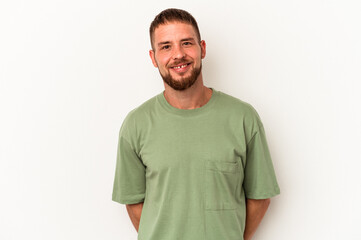 Obraz premium Young caucasian man with diastema isolated on white background happy, smiling and cheerful.