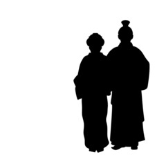 Silhouette of man and woman in national asian costume.