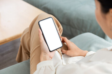 cell phone blank white screen mockup.hand holding texting using mobile on desk at office.background empty space for advertise.work people contact marketing business,technology