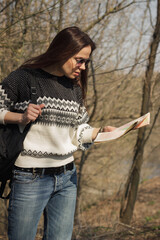Beautiful woman in the forest, blurred background
