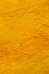 simple handmade paper texture used as background high-resolution image. textured yellow paper used for decorative purpose wallpaper. 
