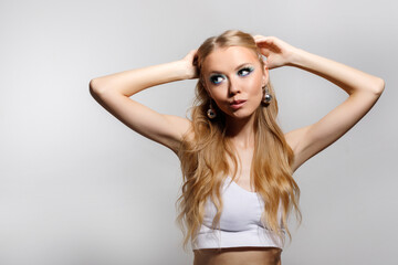 Obraz premium portrait of a model with winter makeup trendy on a gray background