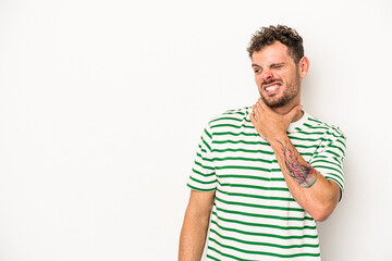 Fototapeta premium Young caucasian man isolated on white background touching back of head, thinking and making a choice.