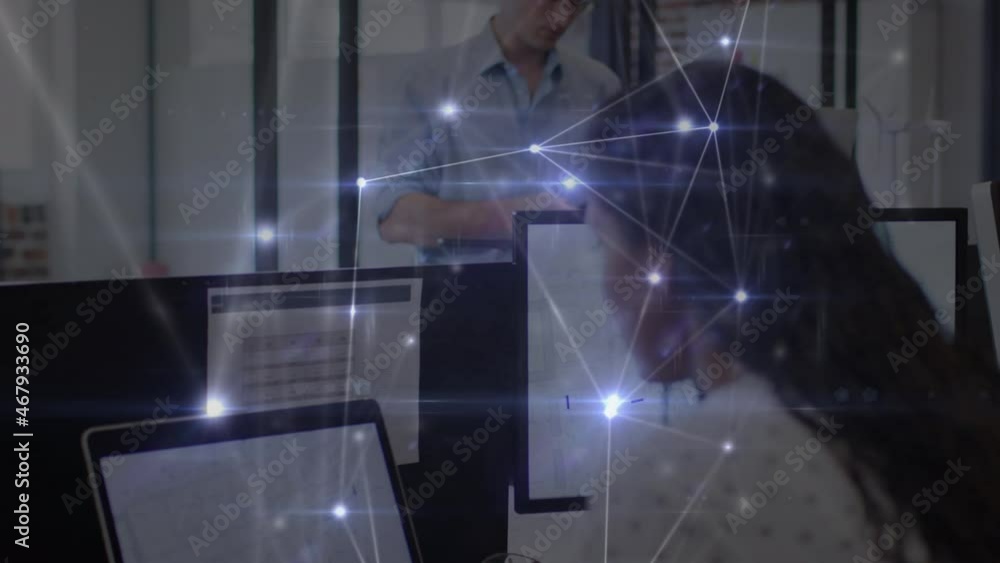 Poster animation of glowing network of connections over woman working with computers in office
