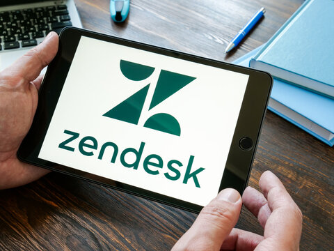 KYIV, UKRAINE - October 20, 2021. Hand holds Zendesk company logo.