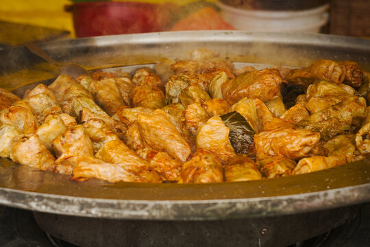 Traditional Balkan winter dish -  cabbage rolls filled with minced meat, rice, fried onion and carrot called sarma