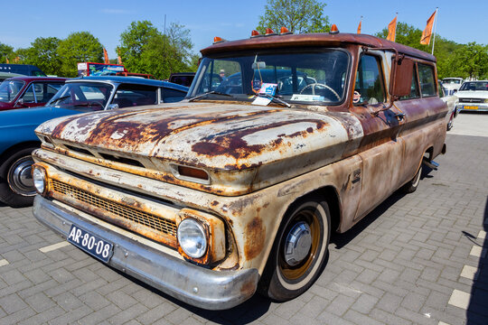 1966 Chevrolet Suburban C10 classic car on the parking lot. Rosmalen, The Netherlands - May 8, 2016