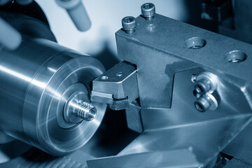 The  CNC lathe machine thread  cutting at the metal stud parts. - obrazy, fototapety, plakaty