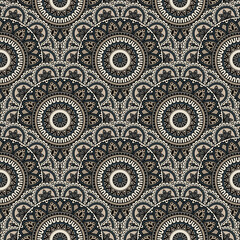 Abstract seamless mandala background. Texture in brown and beige colors. Oriental pattern for design, fashion print, scrapbooking