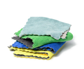 stack of textile multicolored rags for cleaning on a white background