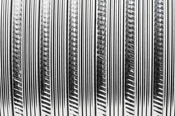 Background made from a macro photo of a flexible corrugated aluminum tube surface.