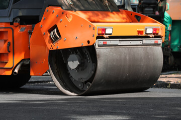 Modern roller on city street, closeup. Road repair service