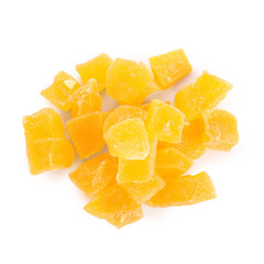 Delicious orange candied fruit pieces on white background, top view