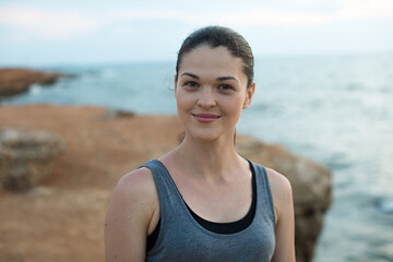 Smiling Female Jogger at Sunset