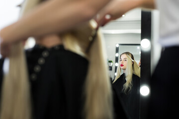 Obraz premium Process of dyeing hair at beauty salon