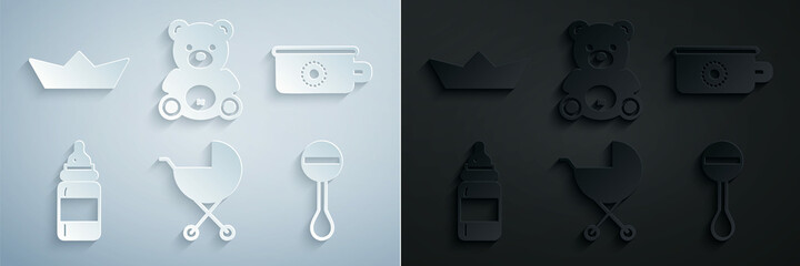 Fototapeta premium Set Baby stroller, potty, bottle, Rattle baby toy, Teddy bear plush and Folded paper boat icon. Vector