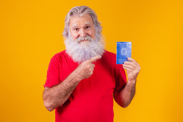 senior bearded teenager holding a Brazilian work card
