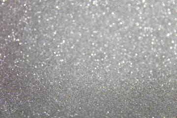 Glitter sparkling silver texture. Beautiful Christmas and new year bokeh background