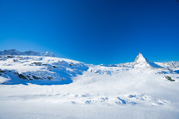 Fototapeta na wymiar Matterhorn, Zermatt, Skiing, Winter Hiking, magical Landscape of Zermatt, Glacier Paradies, Riffelberg, Furi, Rothorn, Monta Rosa, Dufourspitze,Visp, Sunnegga, Gornergrat, Randa, Tasch, Zmutt, Liskam