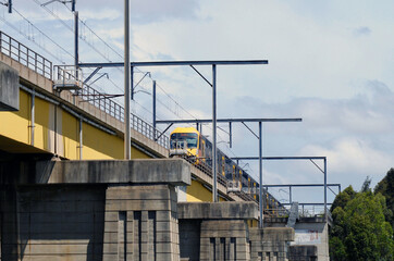 A passenger train on a bridge in Sydney, Australia