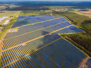 Solar power plant in the field. Aerial view of Solar panels.