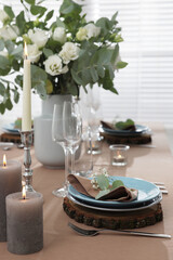 Festive table setting with beautiful tableware and decor indoors