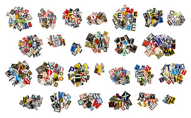 Obraz premium English alphabet letters cutting from magazine paper. Newspaper clippings with letters isolated on white background.