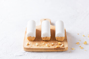 Raw carrot cakes on a wooden board. Sugar, gluten and lactose free.