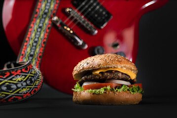 Hamburguesa sencilla con fondo rockero