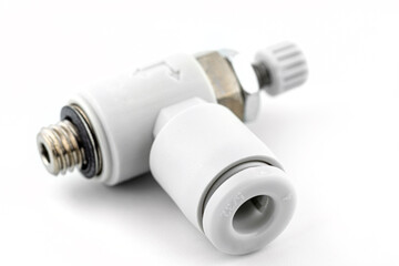 Macro image of a white adjustable air pneumatic elbow fitting with steel external thread, isolated on a white background.