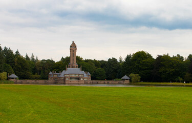 Fototapeta premium Panoramic view of the famous monumental hunting castle Jachthuis Sint-Hubertus in national park De Hoge Veluwe